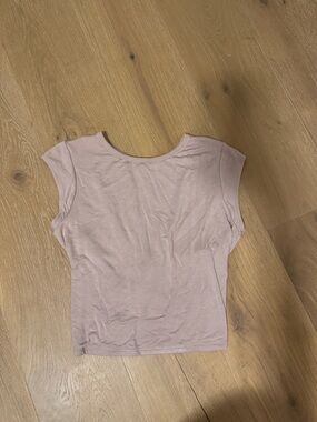 Sleeveless Crew Neck crop Top in Blush Beige with twisted back